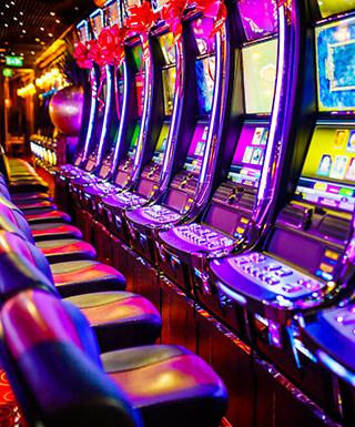 A bank of slot machines inside Hollywood Casino in Bangor, Maine.